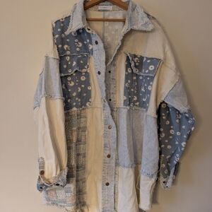 Oversized Patchwork Denim Jacket with Floral Accents And Frayed Edges
